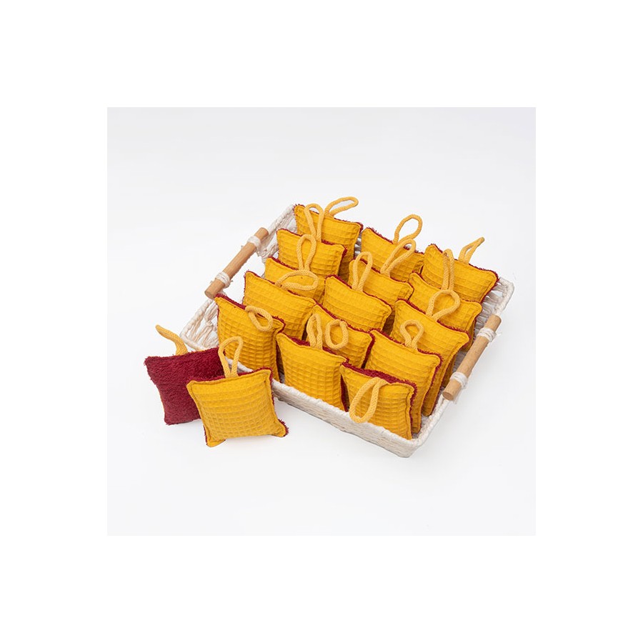 Éponge réutilisable jaune et rouge avec boucle vu de dessus
